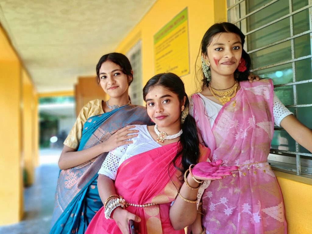 Schoolgirls in traditional saris