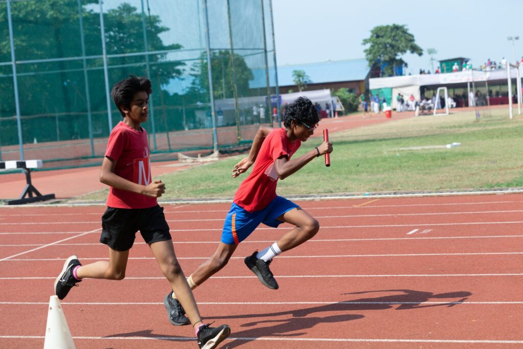 Children running around a track